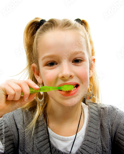 Young gitl with teeth brush