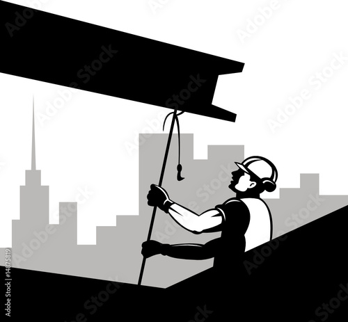 Construction worker hoisting an i-beam