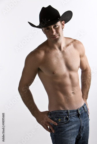 Wallpaper Mural An attractive cowboy with his shirt off in studio Torontodigital.ca