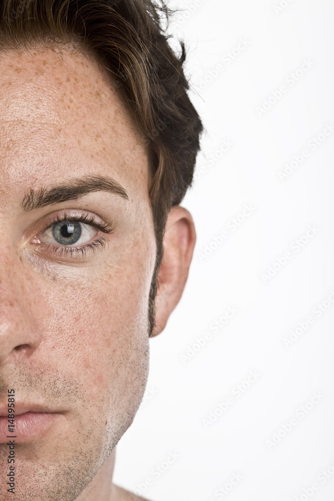 A close up of half of a mans face
