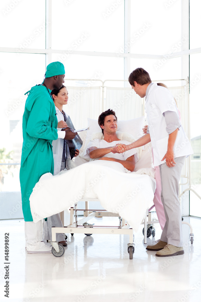 Medical team attending to a patient Medical team attending to a patient