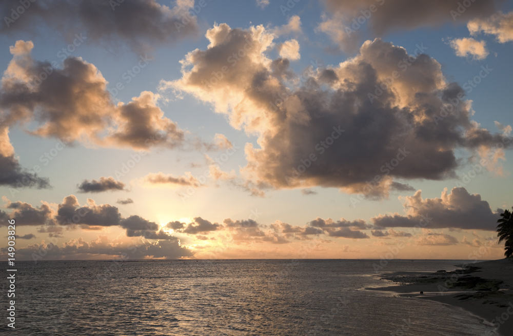 Cloudscape over Ocean and Island at Sunset