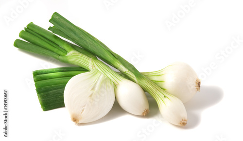 Onions isolated on white background. One cut in half.