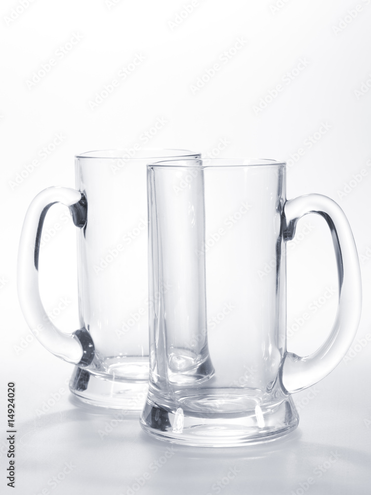 two empty mugs for beer on the table two empty mugs for beer on the table