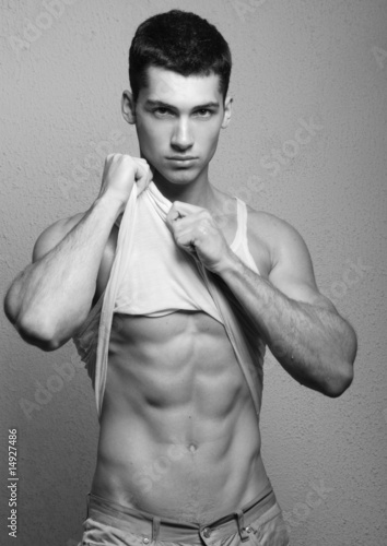 Malke model with a six pack photo