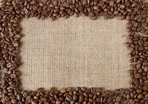 Coffee beans frame on burlap