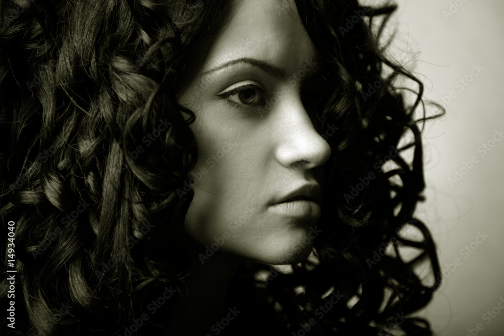 Elegant girl with curly hair Elegant girl with curly hair