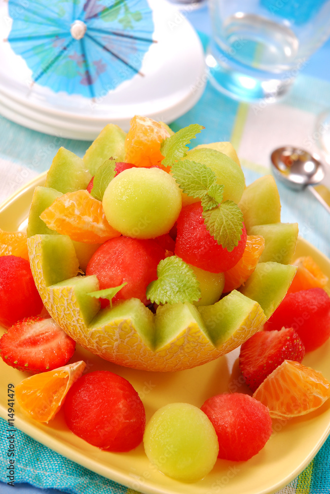 fruits salad in melon bowl fruits salad in melon bowl