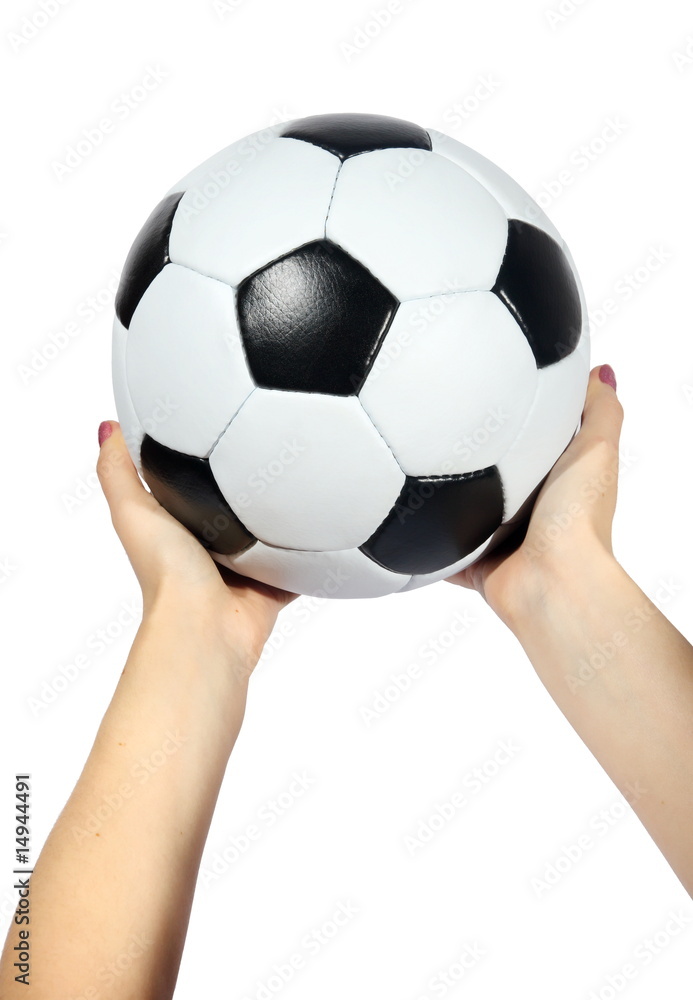 black and white Soccer ball in hands black and white Soccer ball in hands