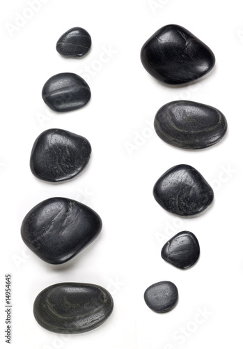 black spa stones with shadows