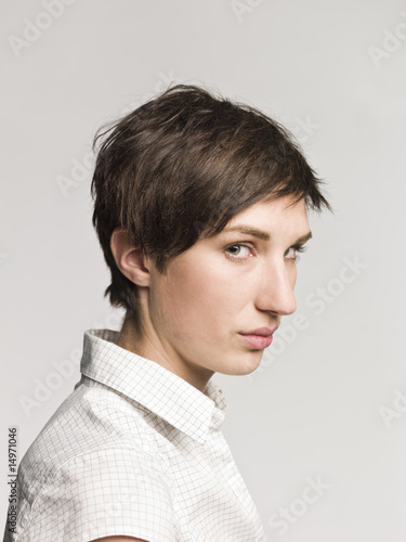 Portrait of a woman towards white background