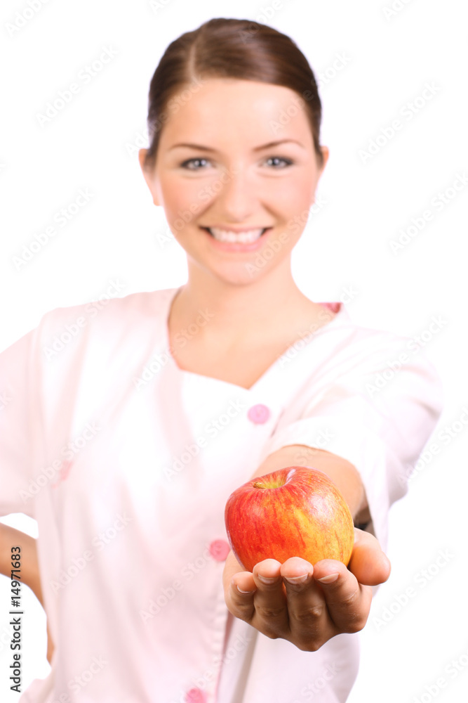 Nurse offering an apple Nurse offering an apple