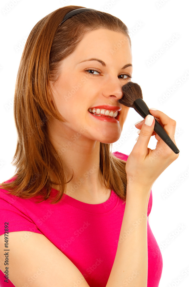Beautiful girl doing makeup. Isolated on white Beautiful girl doing makeup. Isolated on white