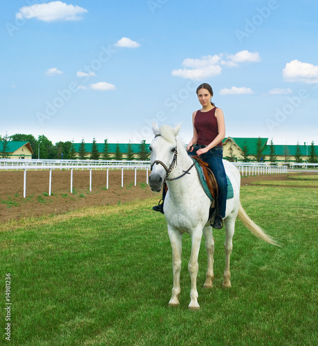 girl astride a horse
