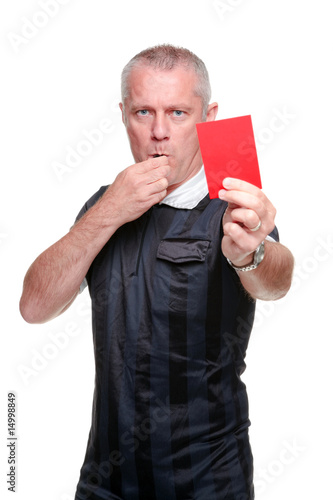 Football referee showing the red card