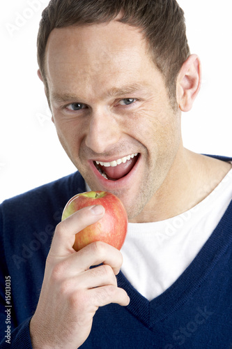 Man Taking Bite Of Apple