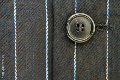 Obraz na płótnie Suit button w salonie