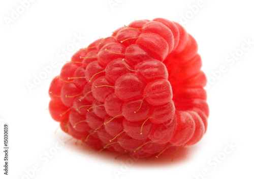 single perfect raspberry on white background