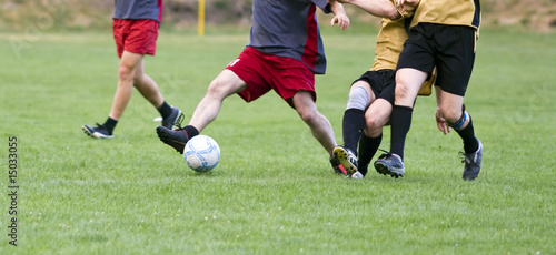 Soccer players fighting for the ball © Melinda Nagy