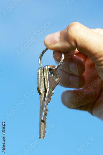 hand keys in the blue skies
