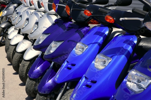 Scooter motorbikes in a row with perspective