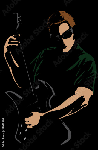 Portrait of the young man with a guitar