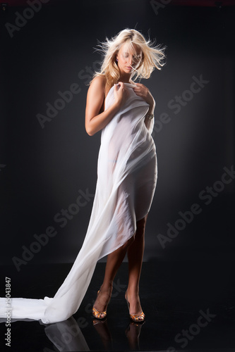 Young Topless Woman With White Fabric