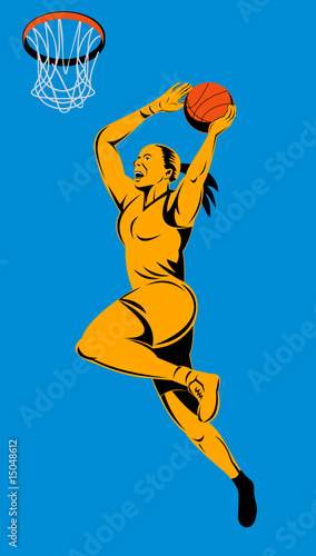 Woman basketball player layup the hoop