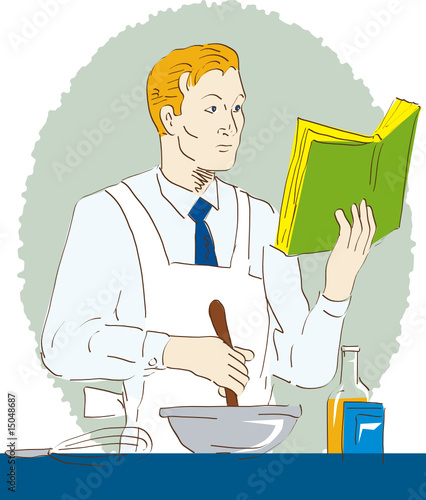 Male cook reading cookbook