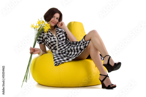 Pretty woman with yellow day-lily photo