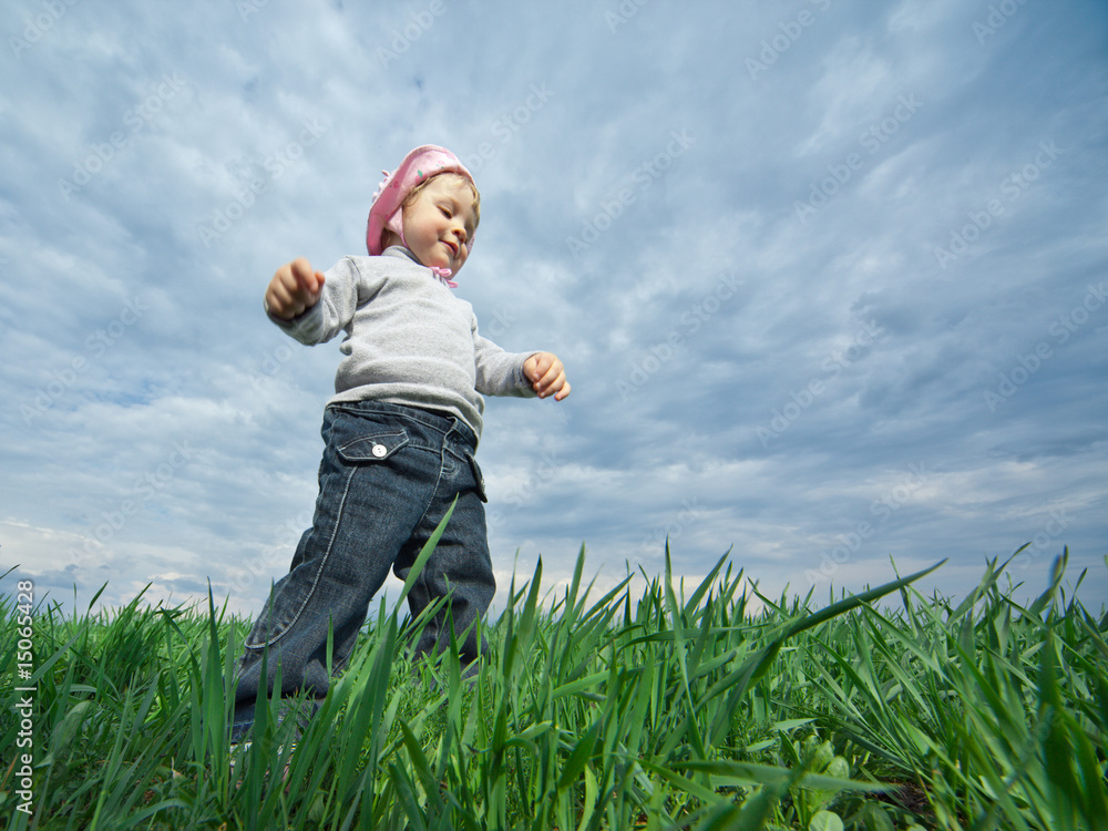 Little girl in field