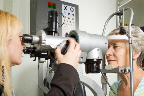 Lady having eye test examination