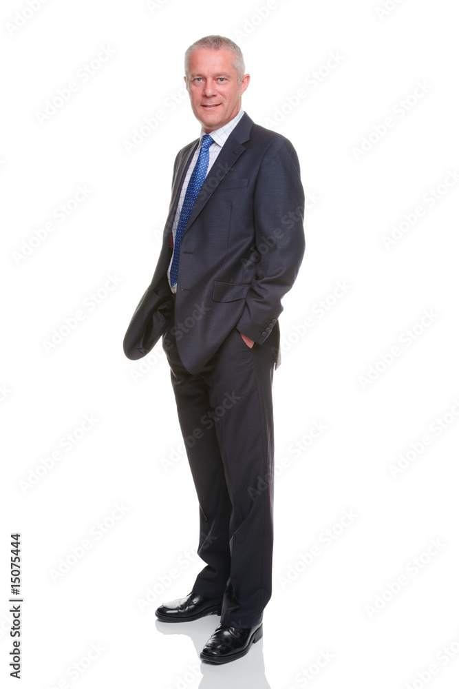 Businessman hands in pockets full length portrait Businessman hands in pockets full length portrait
