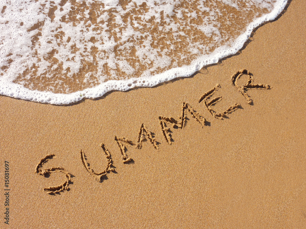 Fototapeta premium Summer written in the sandy beach