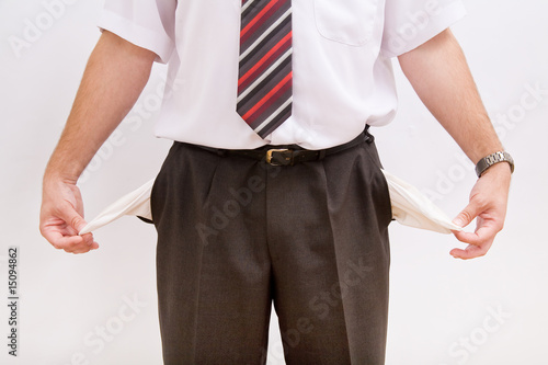 Business man with empty pockets