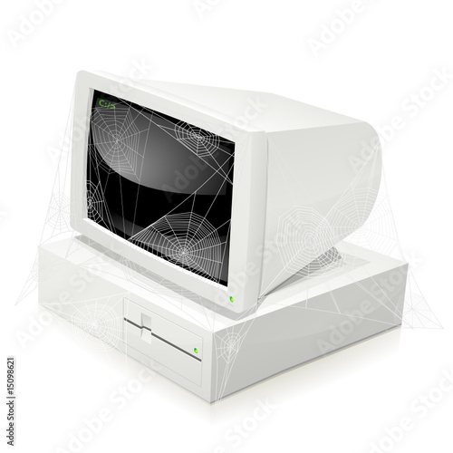 Ordinateur des années 80 sous les toiles d'araignées (reflet)