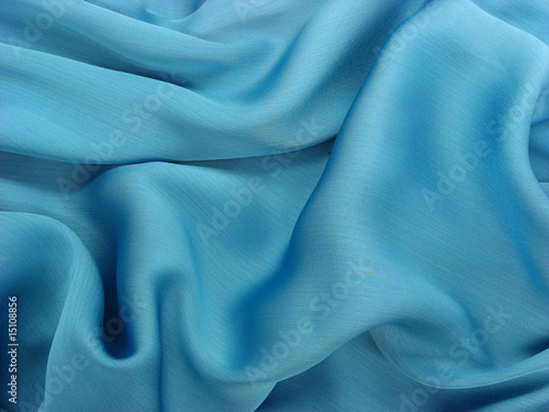 Wrinkled shiny blue fabric
