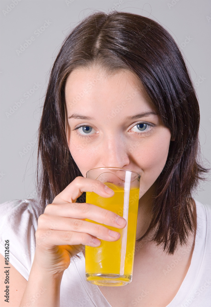 Portrait of beautiful woman with glass of juice Portrait of beautiful woman with glass of juice
