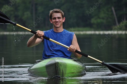 Man Smiling on Kayak