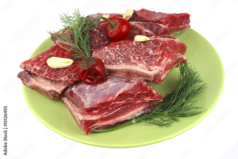 uncooked ribs on dish uncooked ribs on dish
