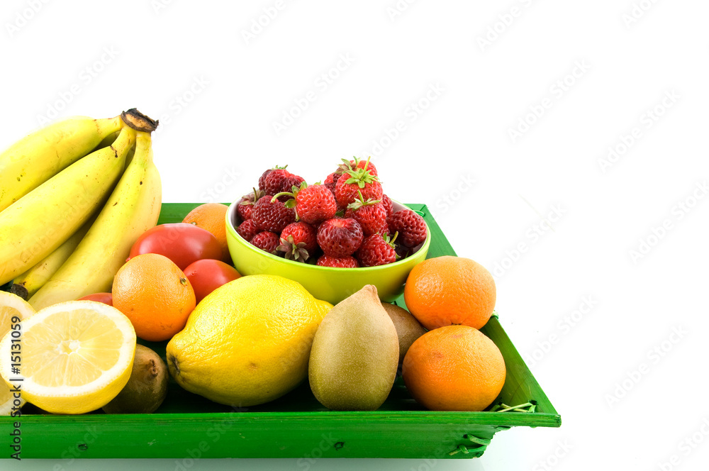 Summer fruit on green tray on white background Summer fruit on green tray on white background