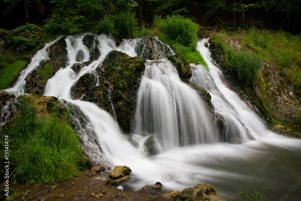 Waterfall in green forest shoot at long exposure