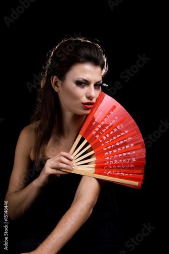 Beautiful woman with fan