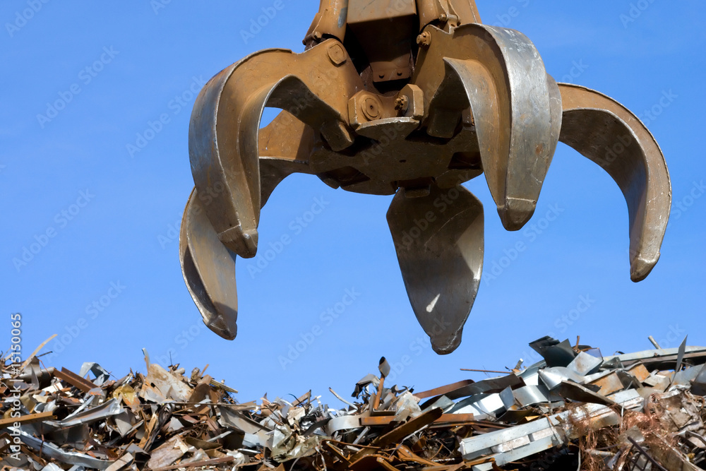 Ταπετσαρία crane grabber up on the metal heap