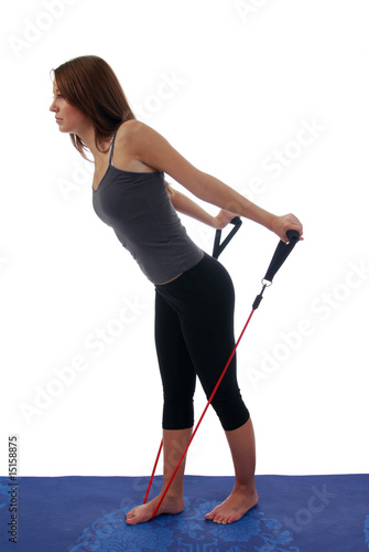 Woman Exercising With Resistance Rope