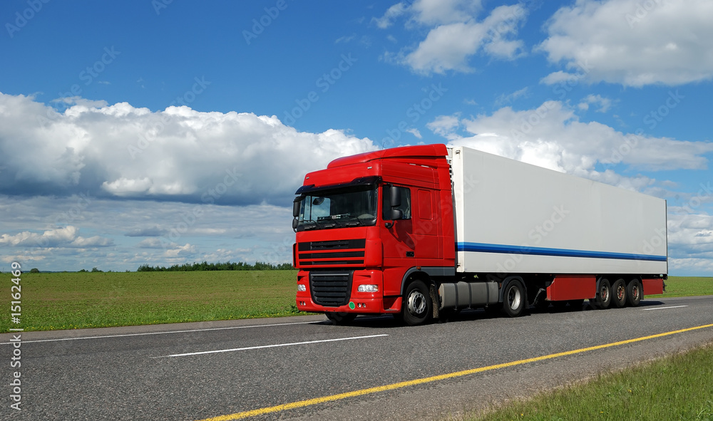 red lorry with white trailer