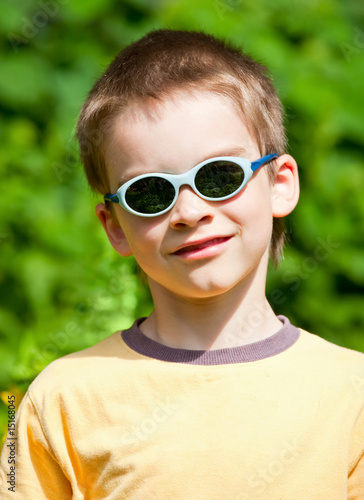 Kid wearing sunglasses