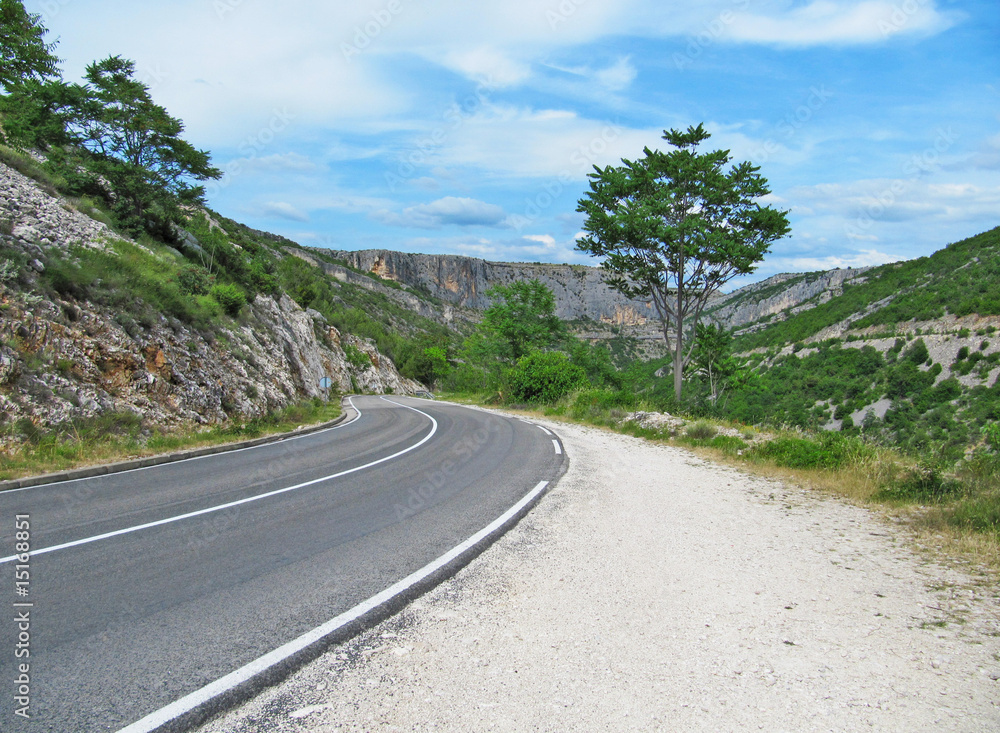 Winding road leading to mountain in Croatia