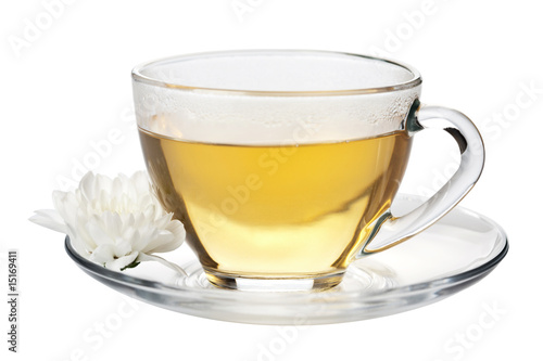 cup of green tea and white flower isolated