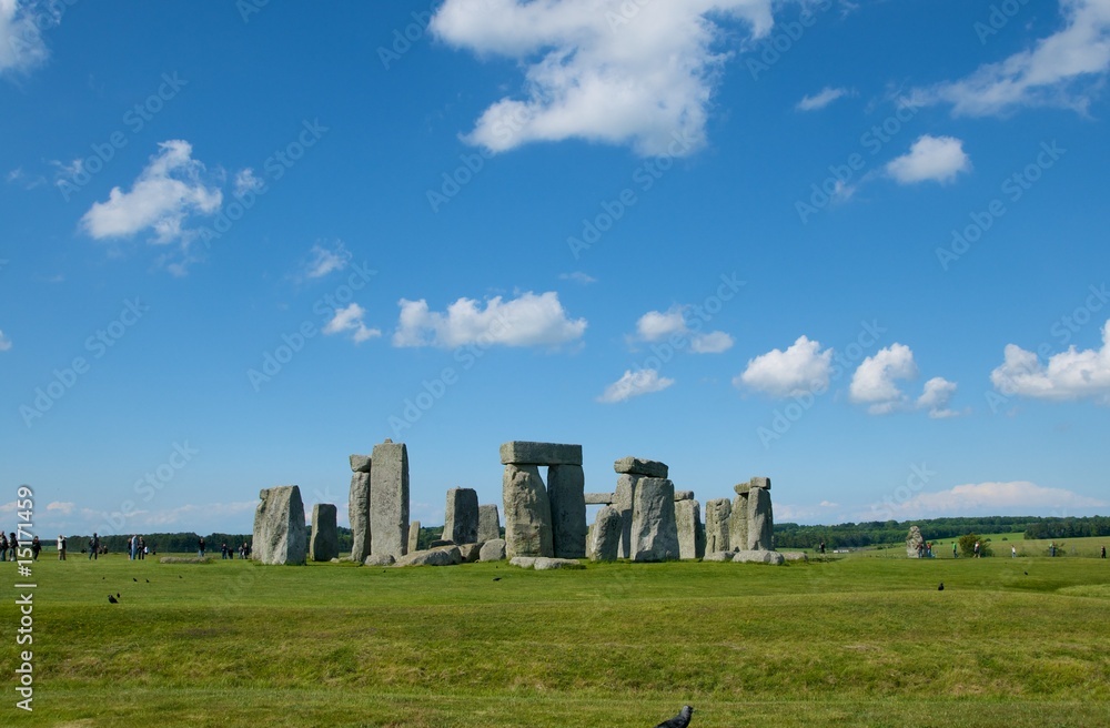 stonehenge in solar summer day against the blue sky